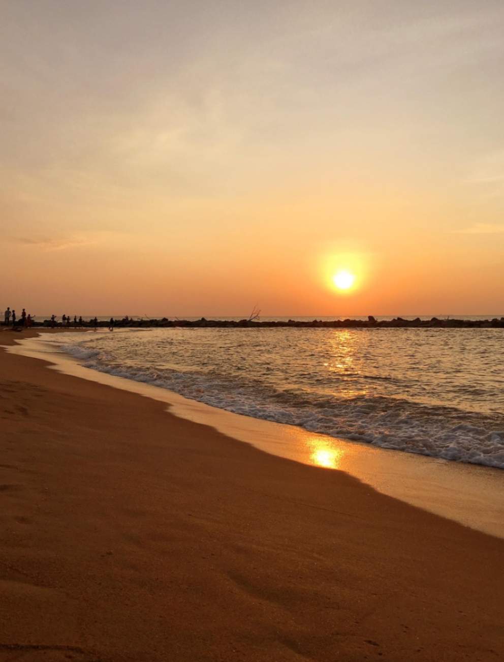 Serene beach at sunset